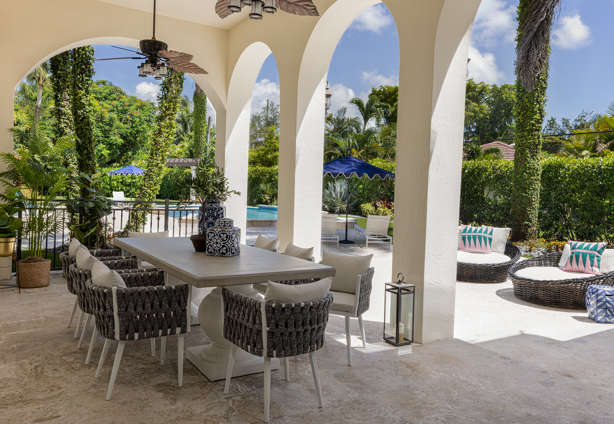 pinecrest, fl residence project - exterior dining area and sun deck with serena and lily table