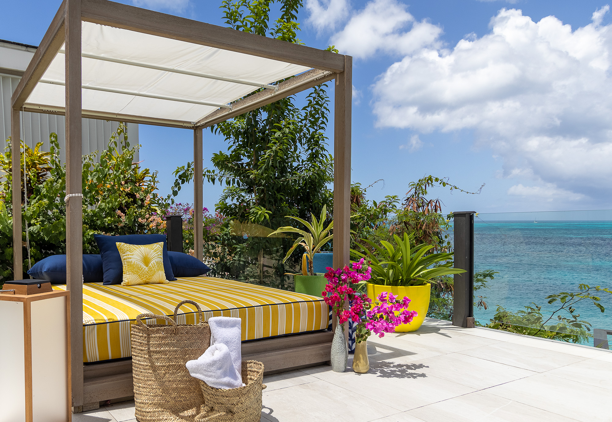 Antigua Tamarind Hills Multi-Level Beachfront Home Ocean Side Lounge with schumacher textile, RH daybed, christopher farr cloth textile