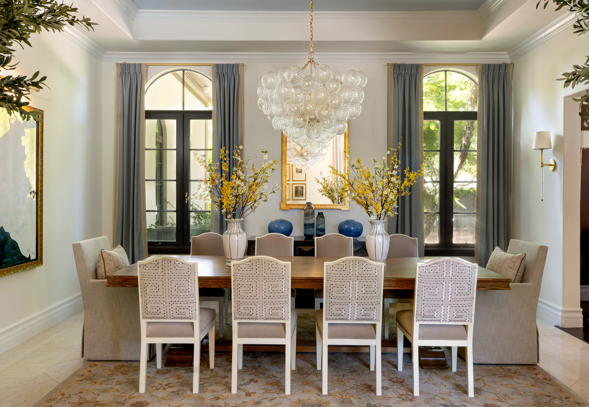 pinecrest, fl residence project - dining room with chaddock dining table, made goods dining chairs, schumacher textile, visual comfort chandelier and sconces